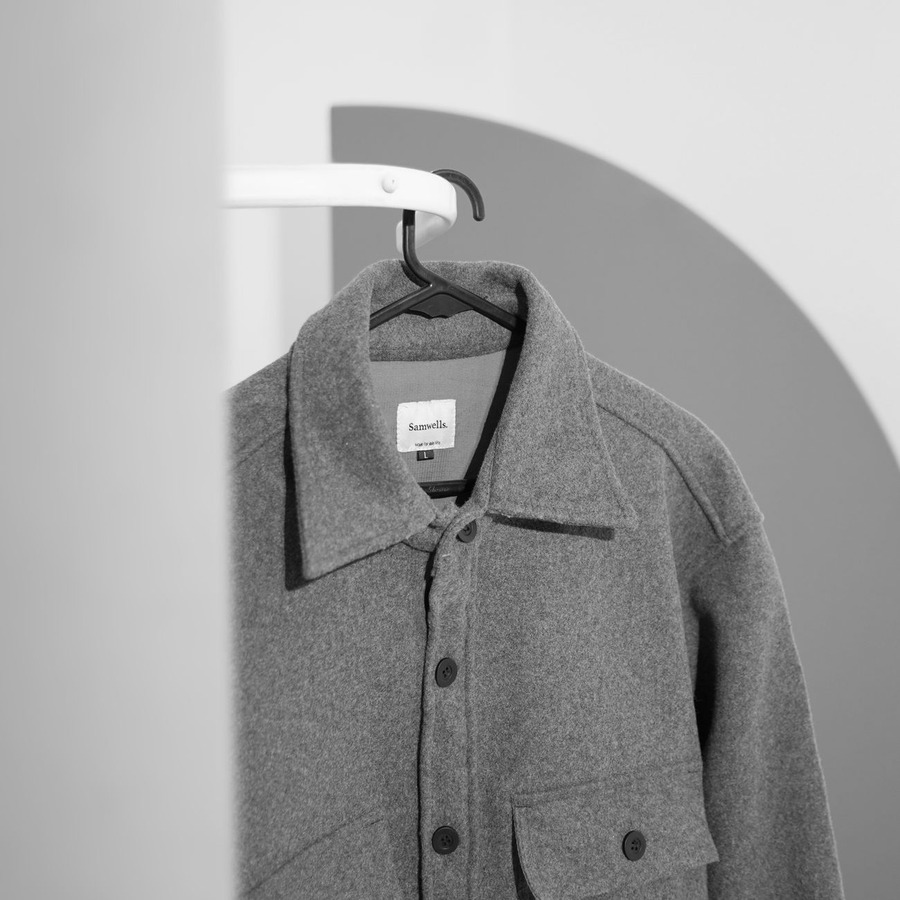 Organized closet after implementing seasonal rotation system with clear zones